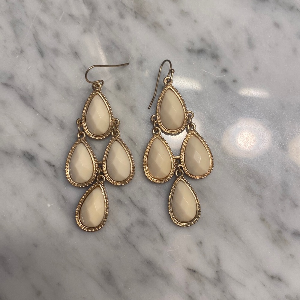 Gold and cream color earrings
